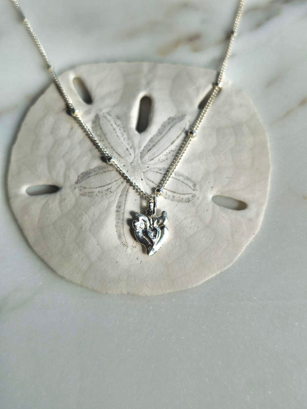Tiny Sacred Heart Necklace in Sterling Silver