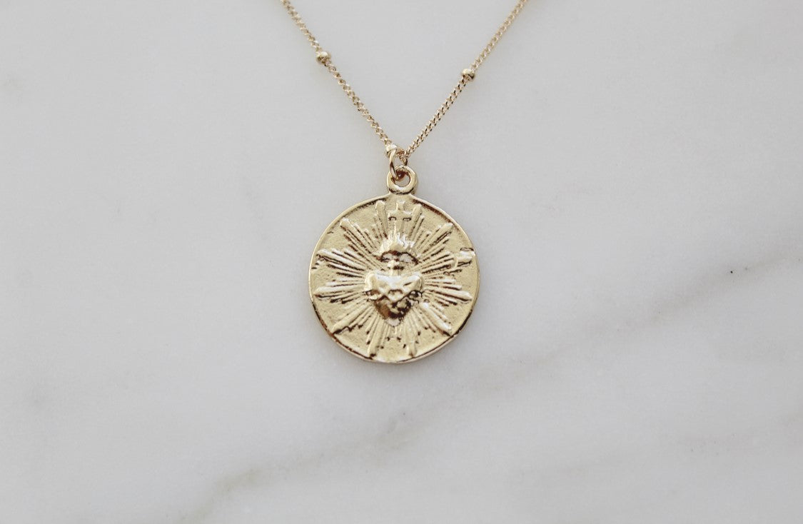 The Little Sacred Heart® minimalist version in 14k Gold