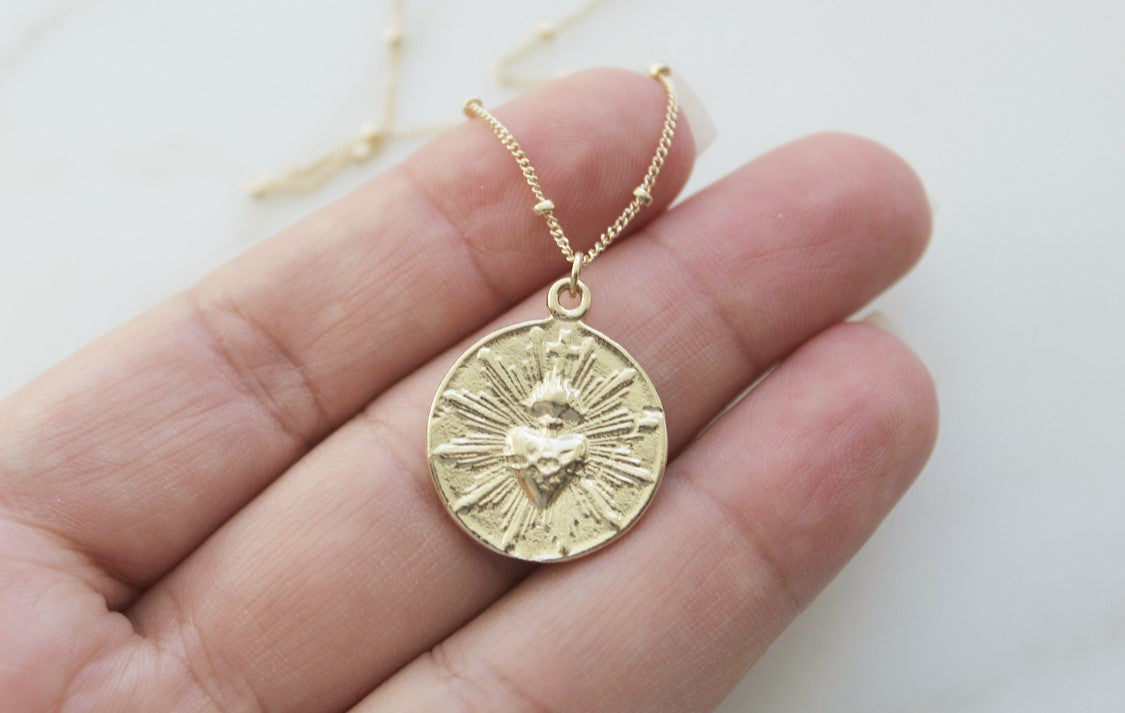 The Little Sacred Heart® minimalist version in 14k Gold