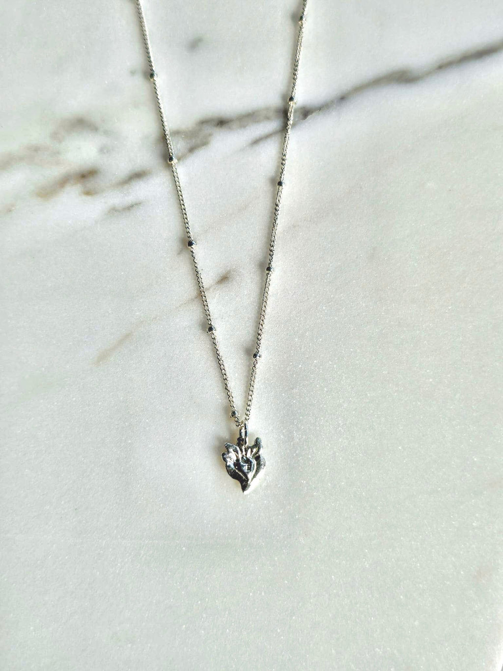 Tiny Sacred Heart Necklace in Sterling Silver