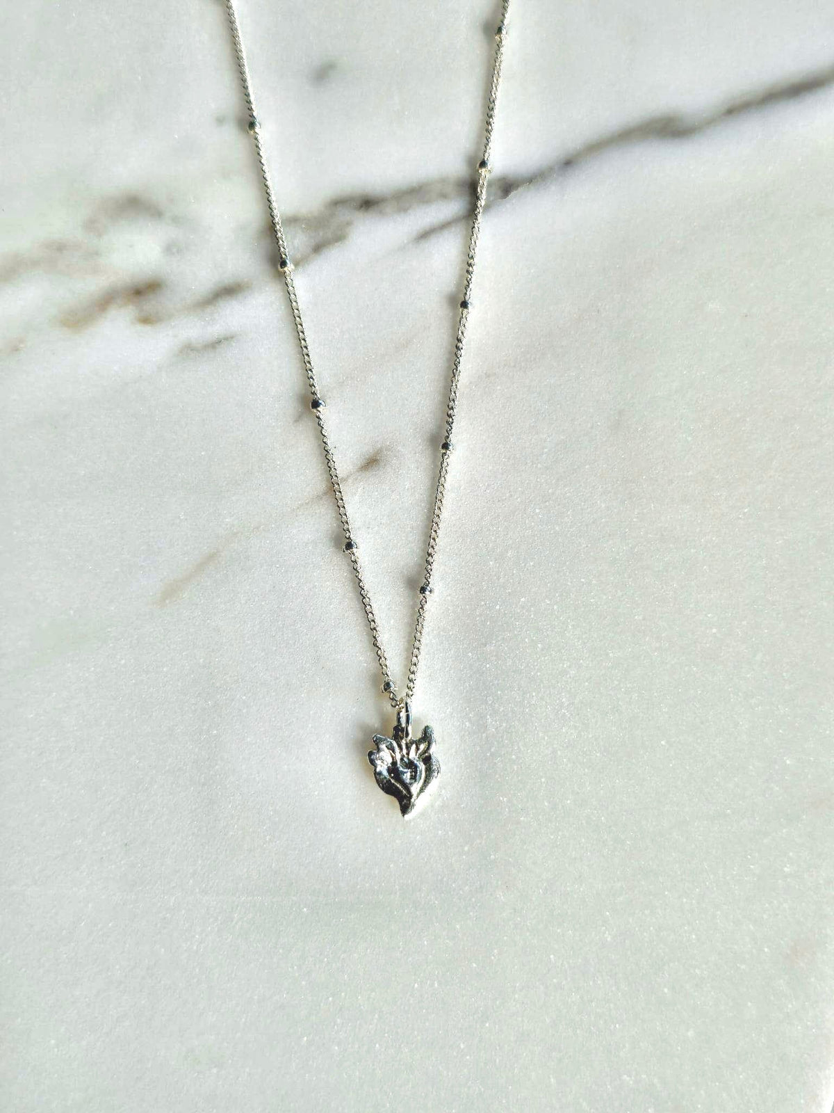 Tiny Sacred Heart Necklace in Sterling Silver