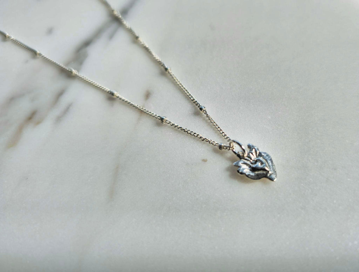 Tiny Sacred Heart Necklace in Sterling Silver