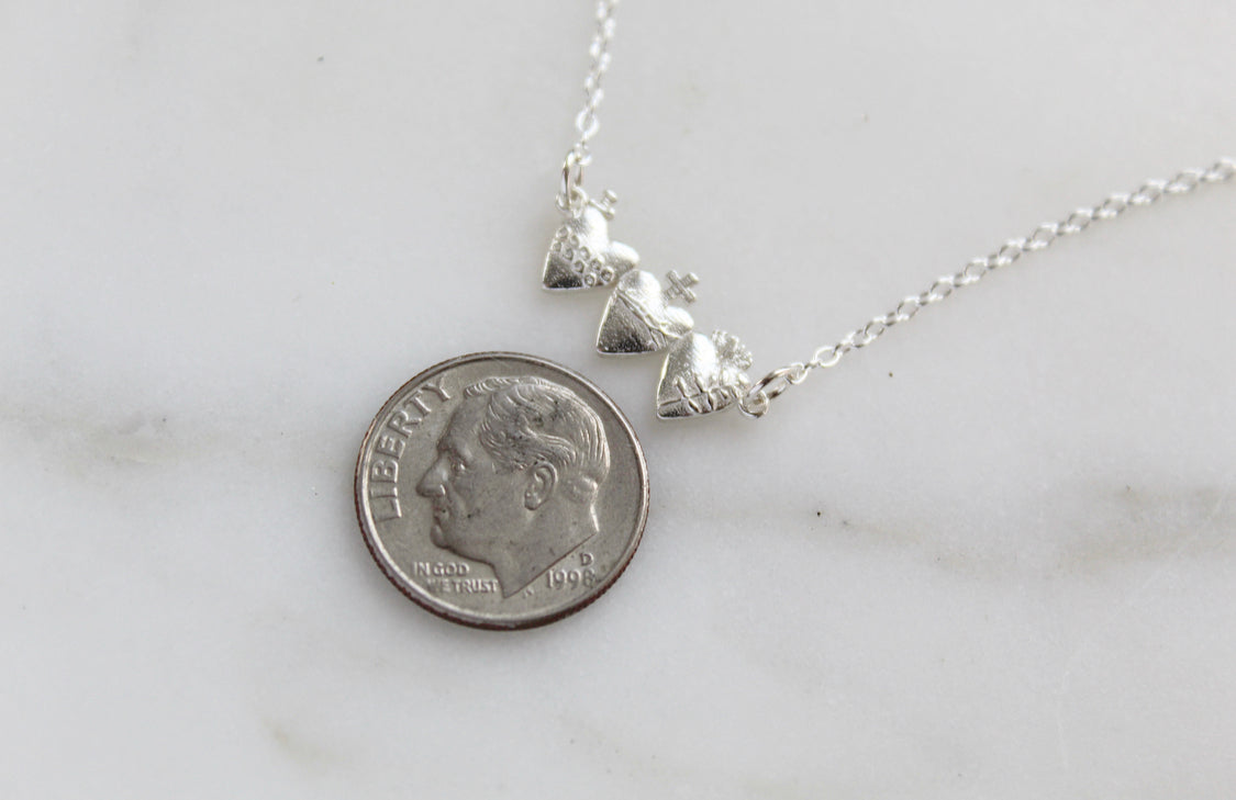 Holy Family Hearts® in Sterling Silver Tiny Version