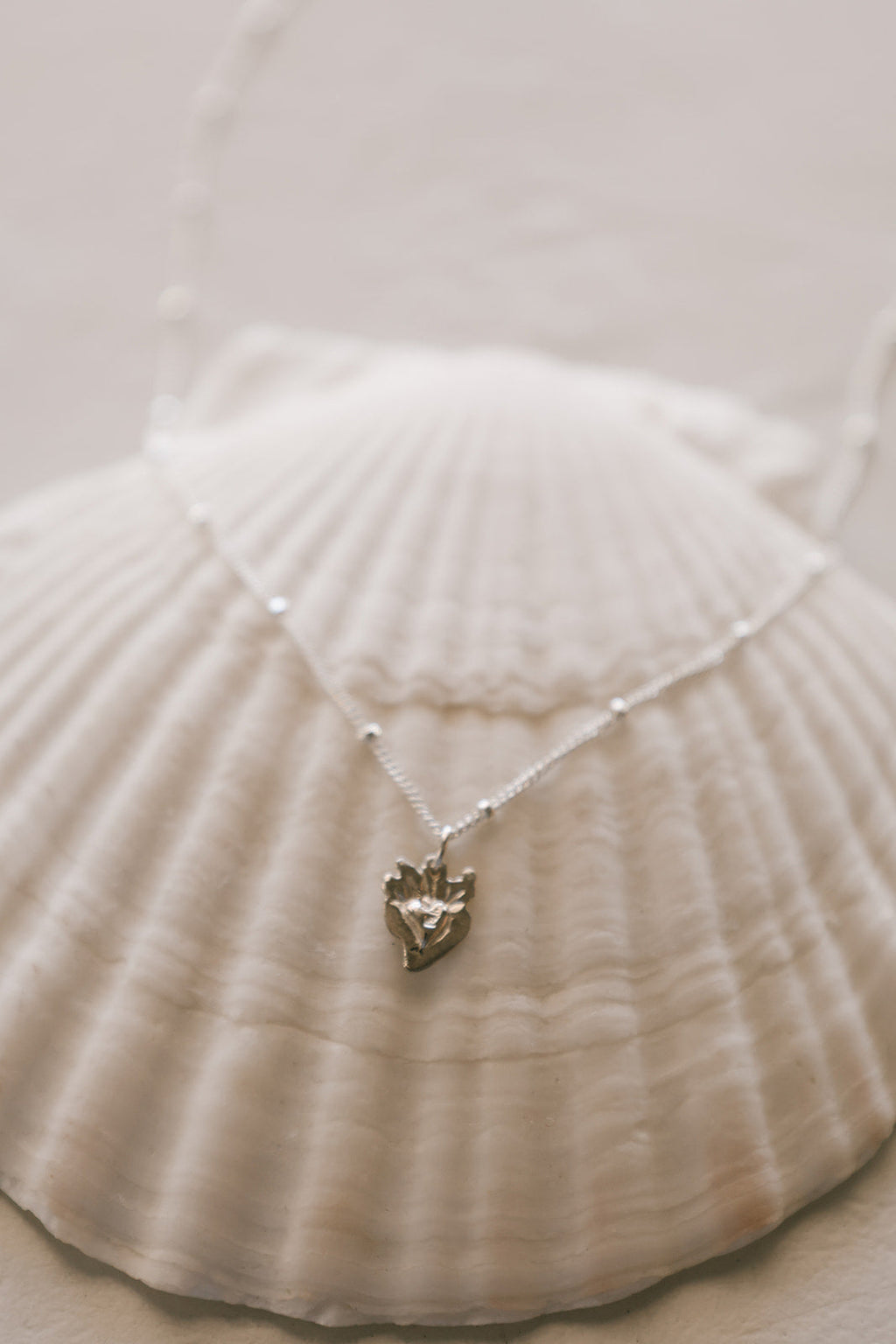 Tiny Sacred Heart Necklace in Sterling Silver