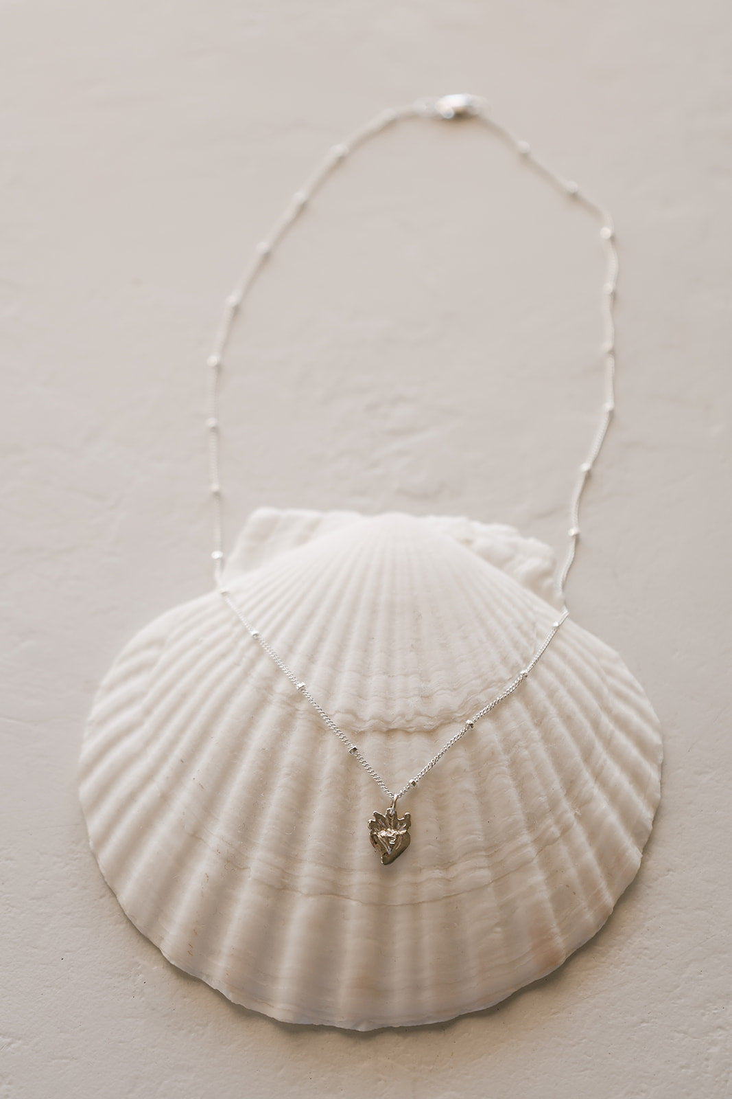 Tiny Sacred Heart Necklace in Sterling Silver