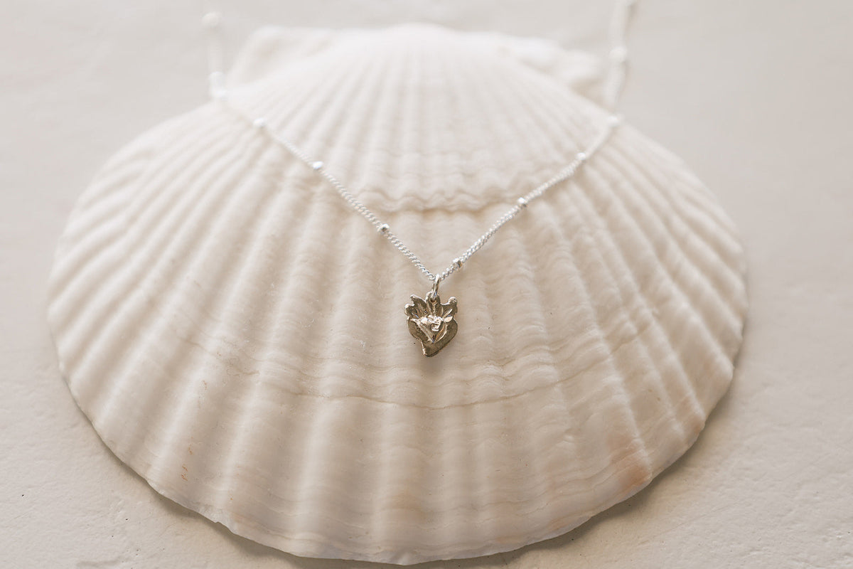 Tiny Sacred Heart Necklace in Sterling Silver