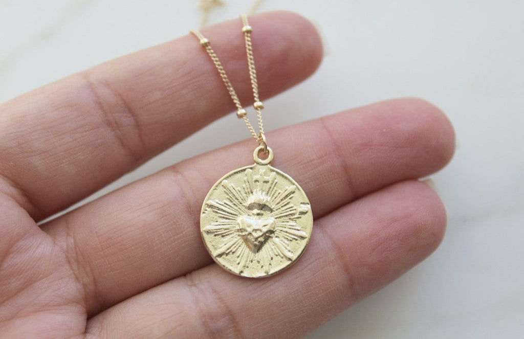 The Little Sacred Heart® minimalist version in 14k Gold
